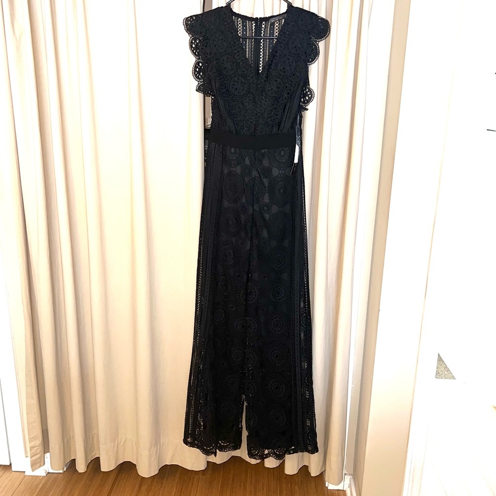 new boutique size small mad for love black lace jumpsuit!